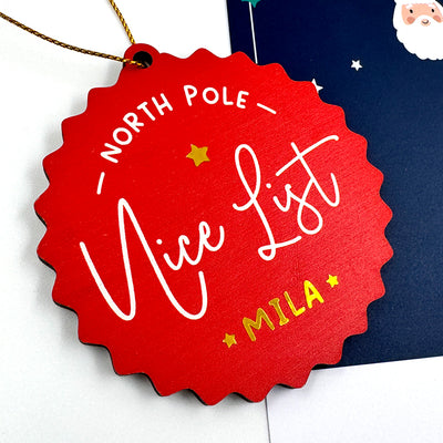 Personalised North Pole Nice List Wooden Tree Decoration