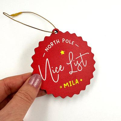 Personalised North Pole Nice List Wooden Tree Decoration